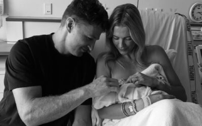 Beauden Barrett, his wife Hannah and their baby