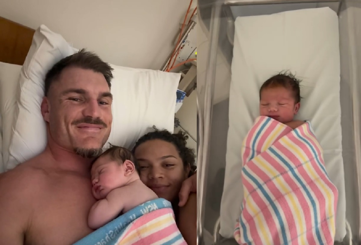 Angus Crichton, his wife and their baby