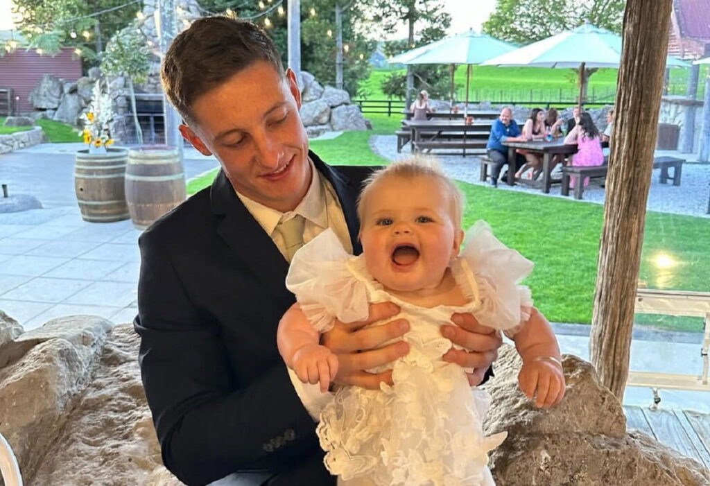 Cam Roigard and his baby