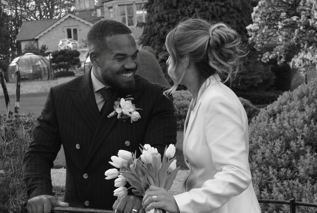 Ollie Lawrence and his wife Emily Morrison on their wedding day