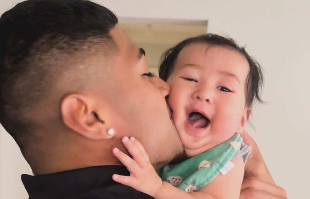 Josiah Karapani and his son